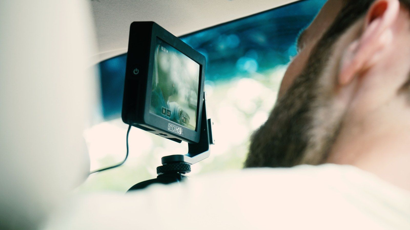 Stock photo of a camera monitor mounted in a vehicle, illustrative only, not the actual Stellantis rearview display
