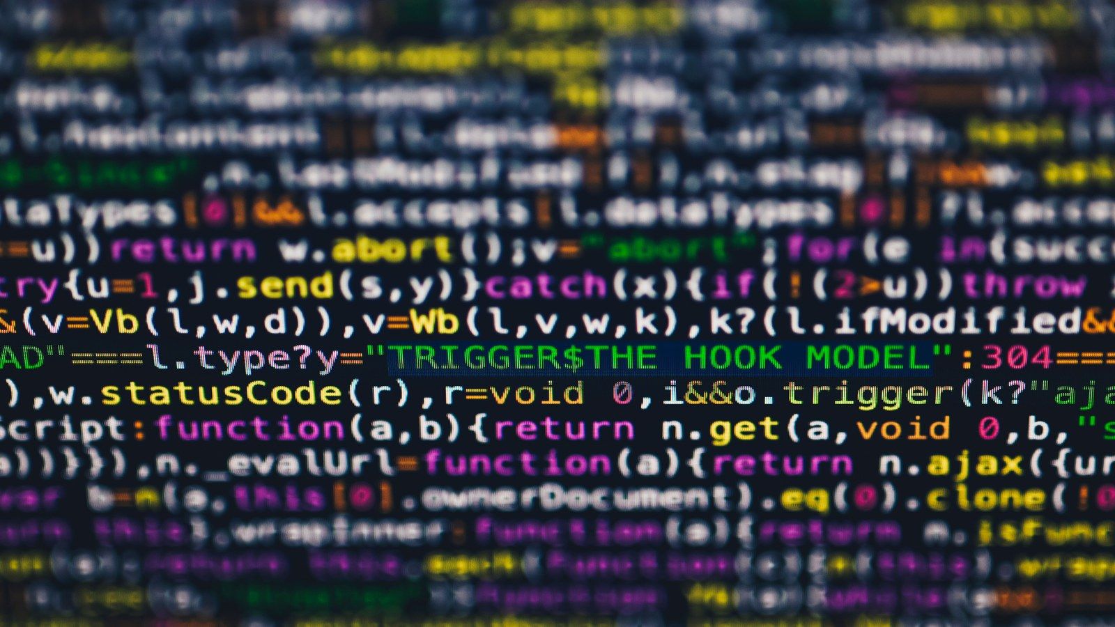 Stock photo of colorful code displayed on a monitor, illustrative only, not an actual Google API console
