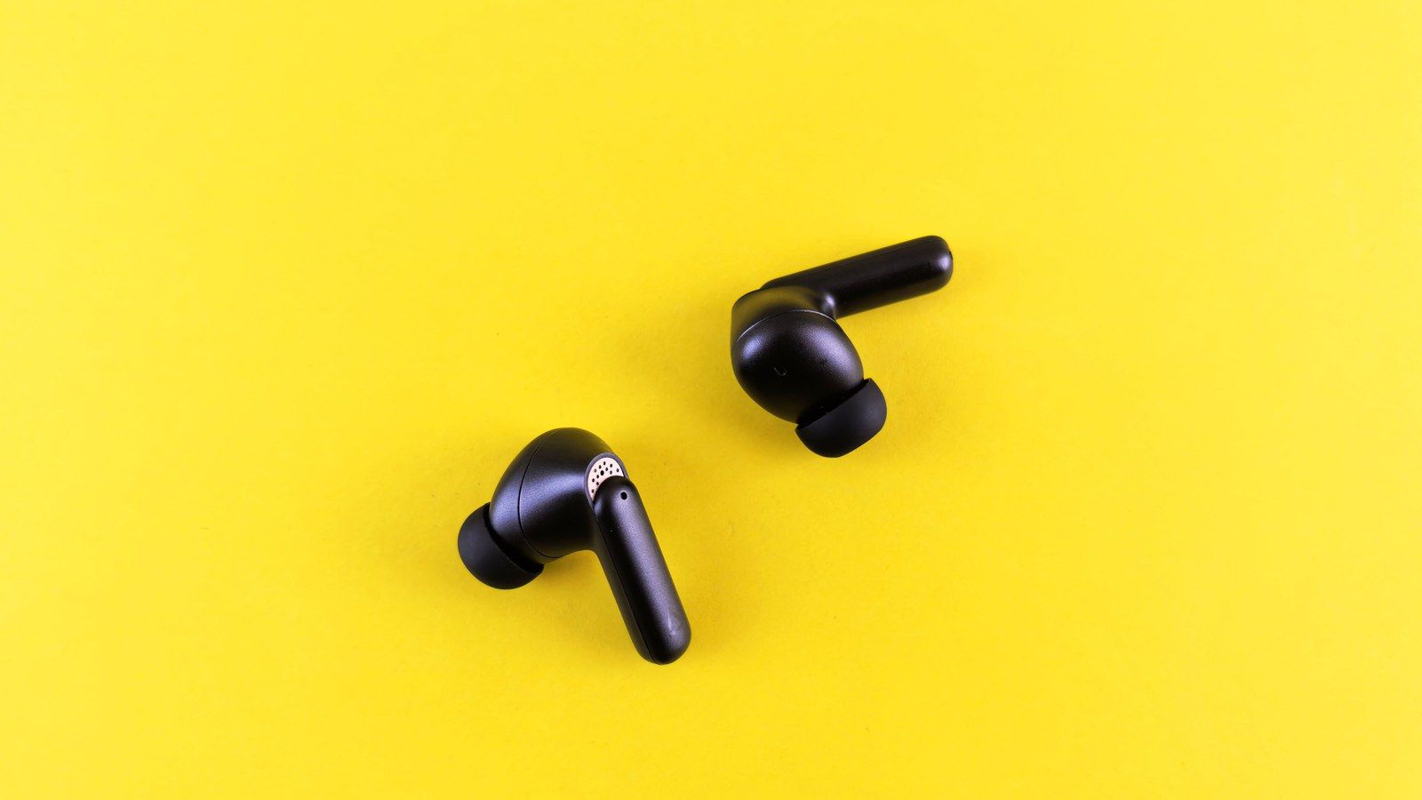 Stock photo of black wireless earbuds, illustrative only, not the actual CMF Buds Neo